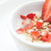 bowl of yogurt with strawberries and granola